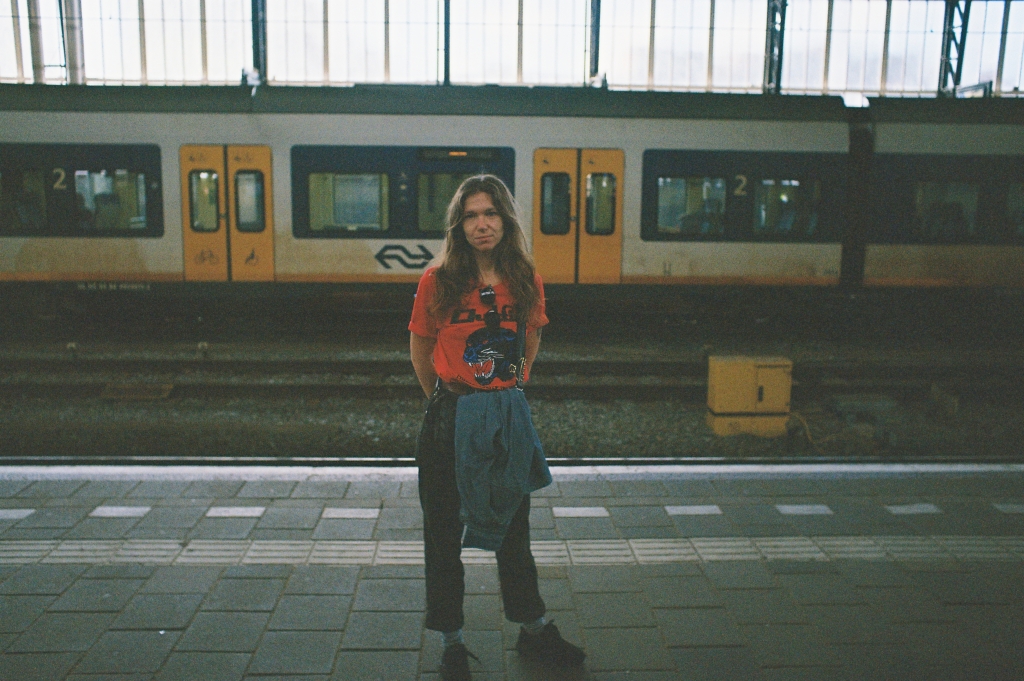 Woman standing in train station